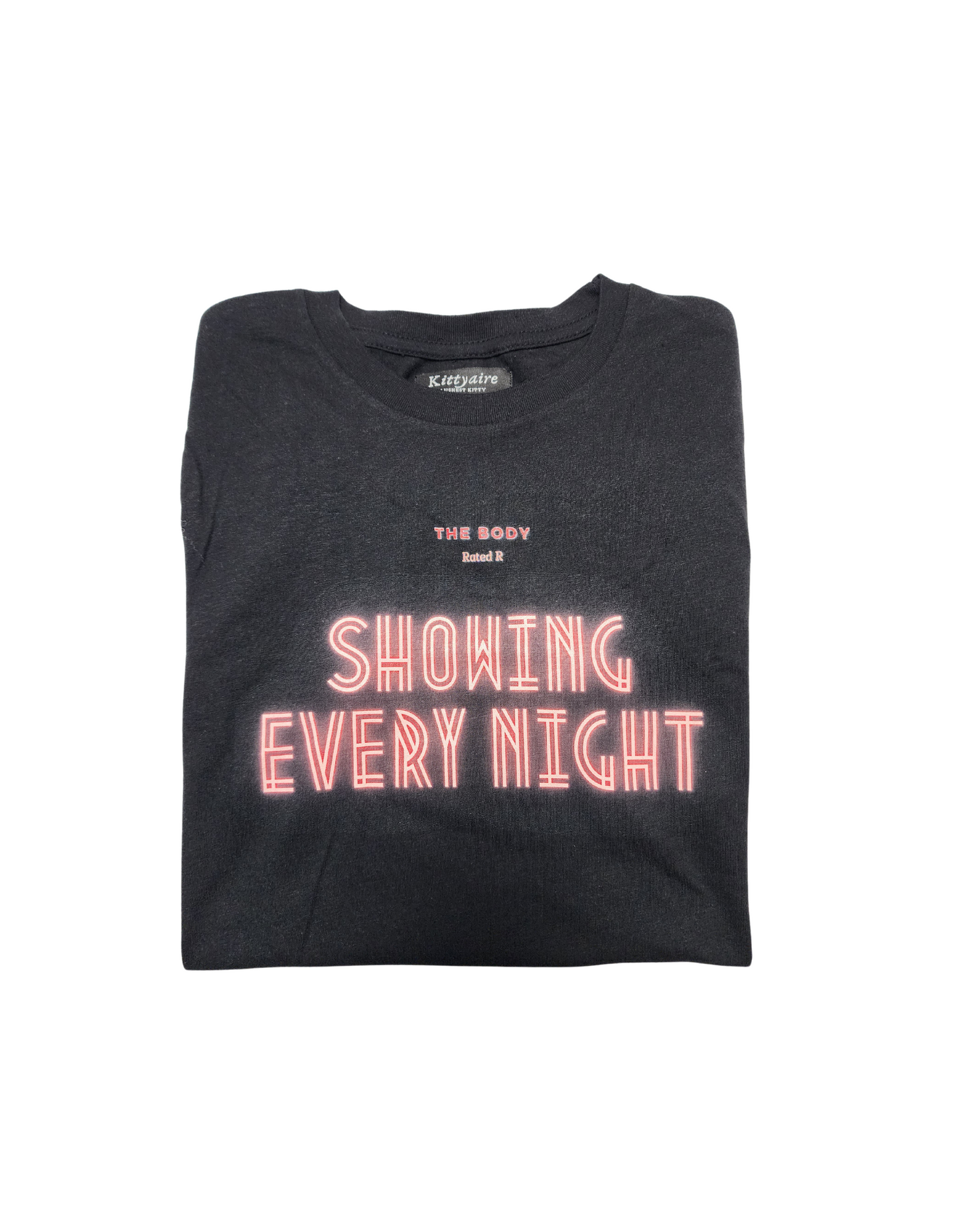 Black female short sleeve shirt. The Body